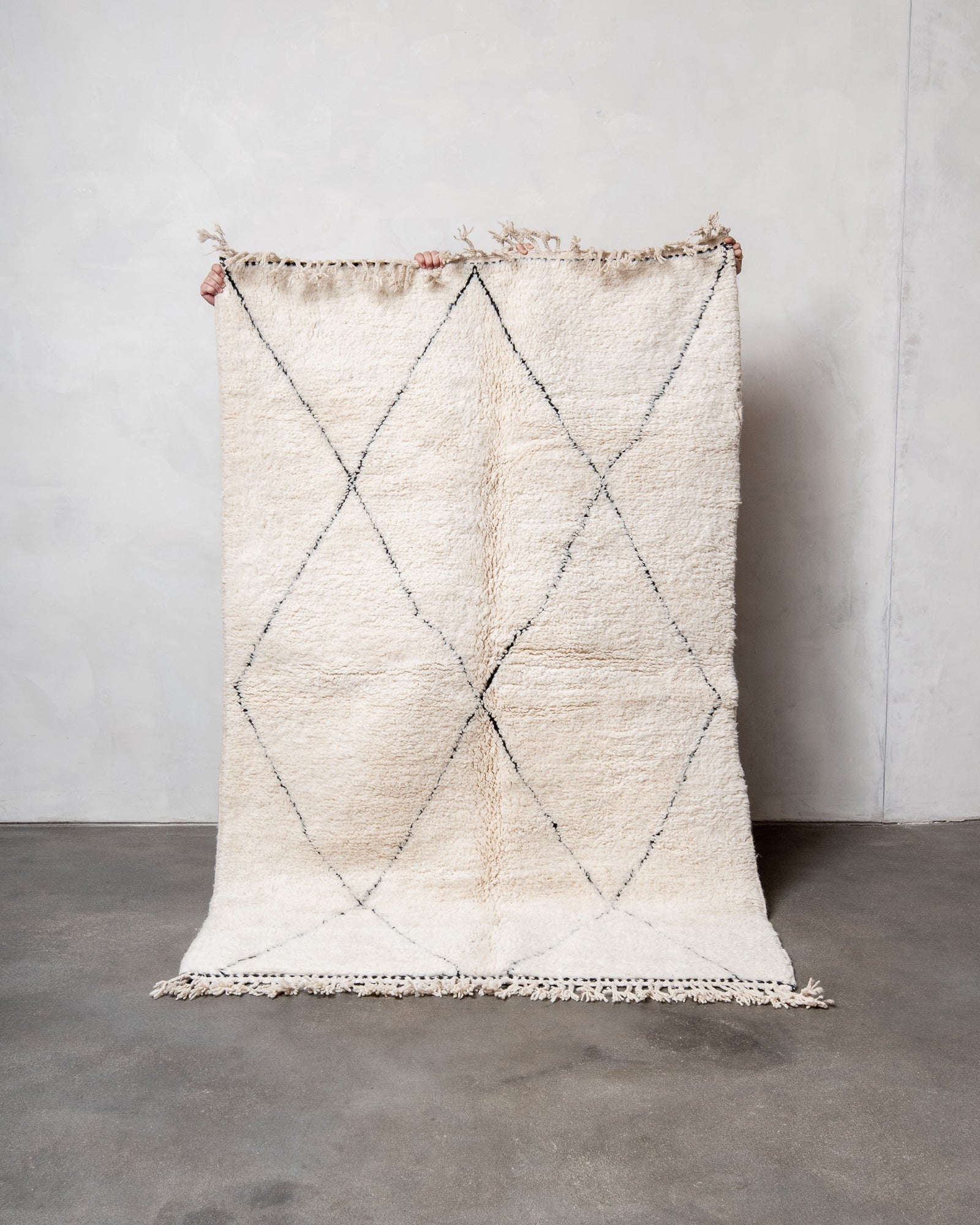 Modern, designer, handcrafted Berber rug from Morocco. Beniourain carpet with beautiful colours and patterns and fluffy wool texture.